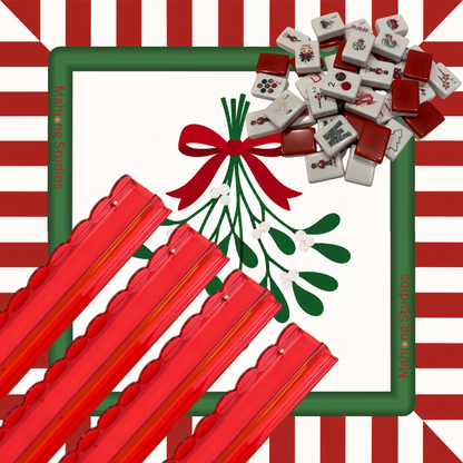Christmas Kiss Mahjong mat with mistletoe red bow and candy stripe border red scalloped racks