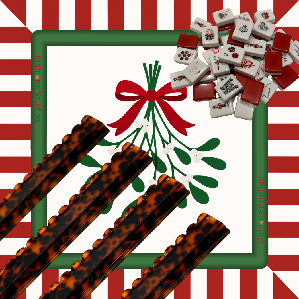 Christmas Kiss Mahjong mat with mistletoe red bow and candy stripe border tortoise shell scalloped racks