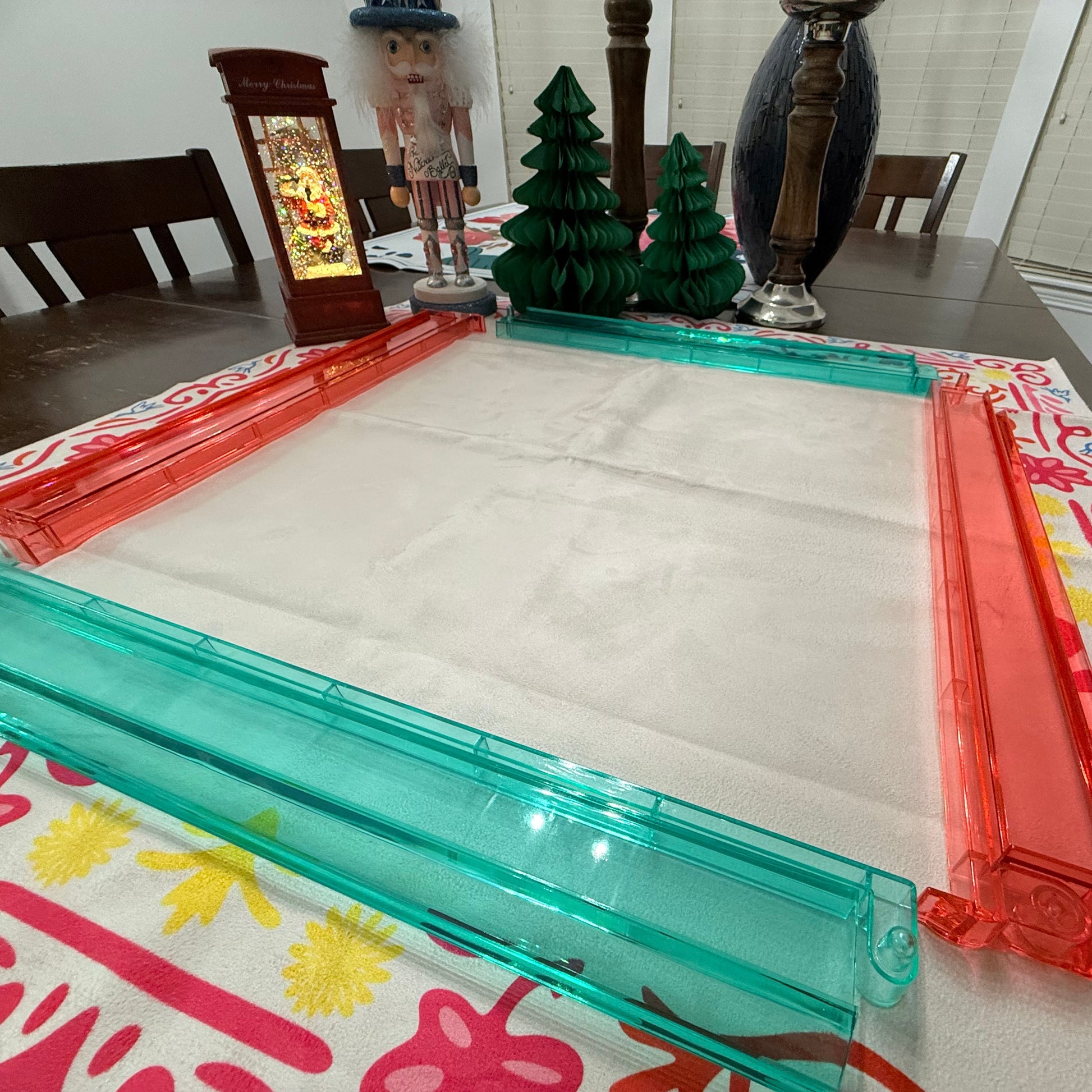 mahjong rack table cover on a dining table with decorative items in the background